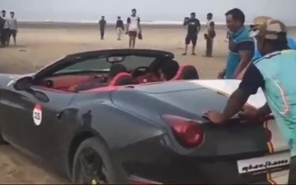 Ferrari California salvo da maré cheia… por um par de bois!